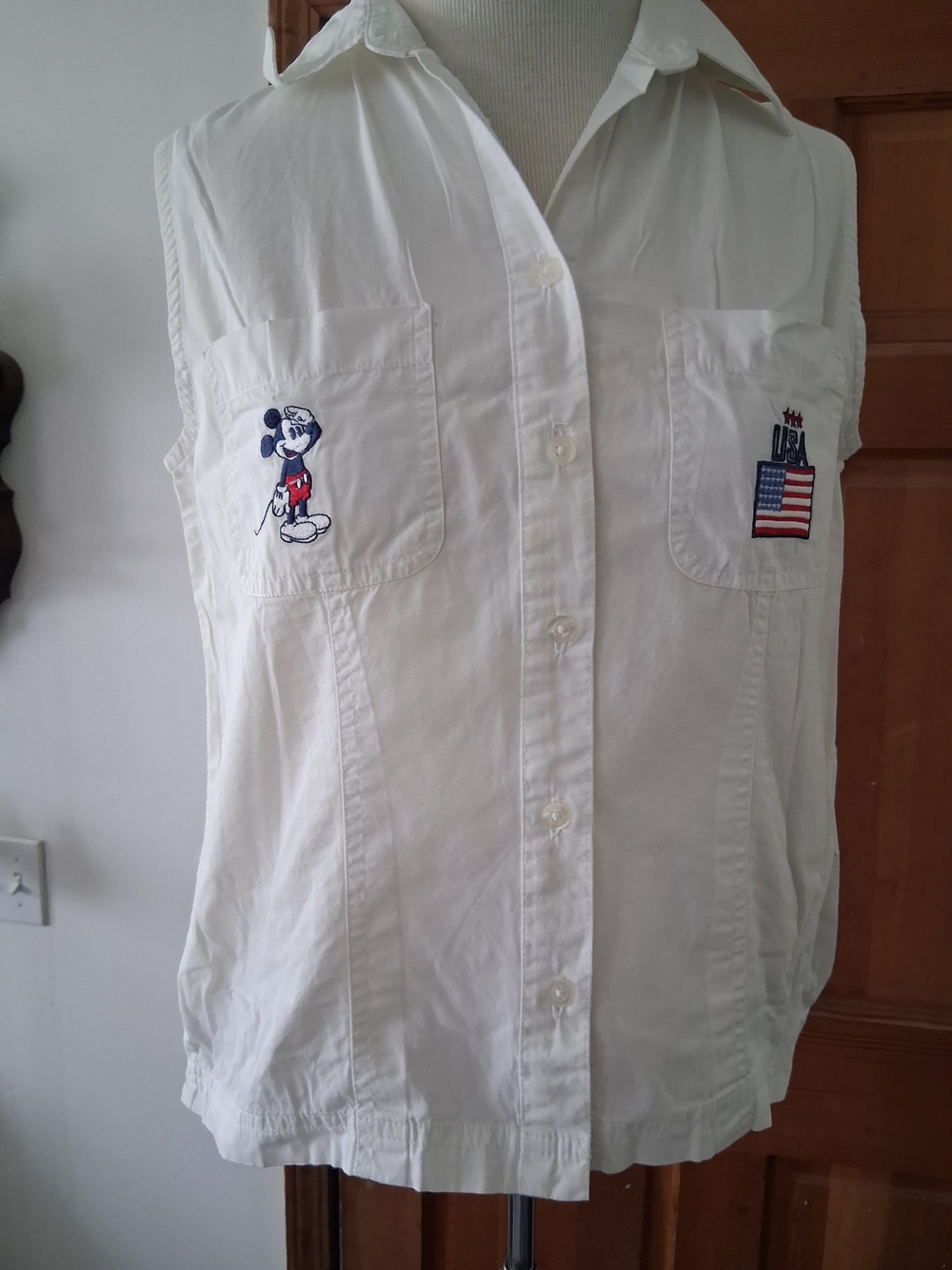 Disney White Sleeveless Button-Down Shirt with Mickey Patch